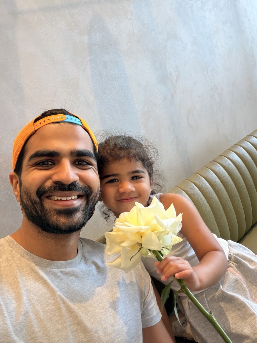 Me with my daughter Abby, who is holding white roses
