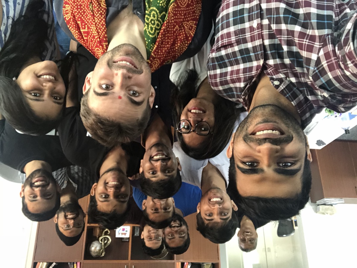 Office selfie with about a dozen of the team